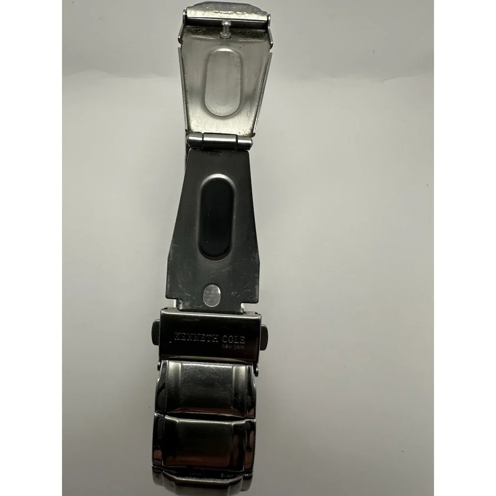 Kenneth Cole it showing